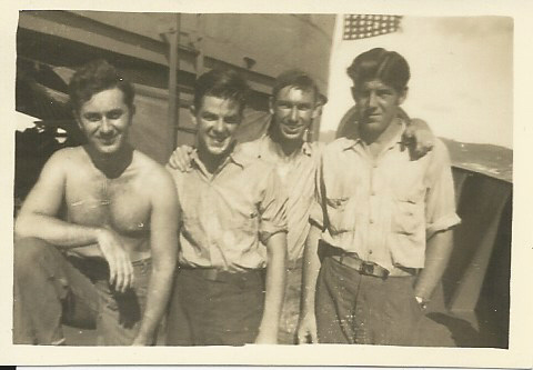 File:ROSudduth 1945-four crew members aboard USS Raccoon.jpg